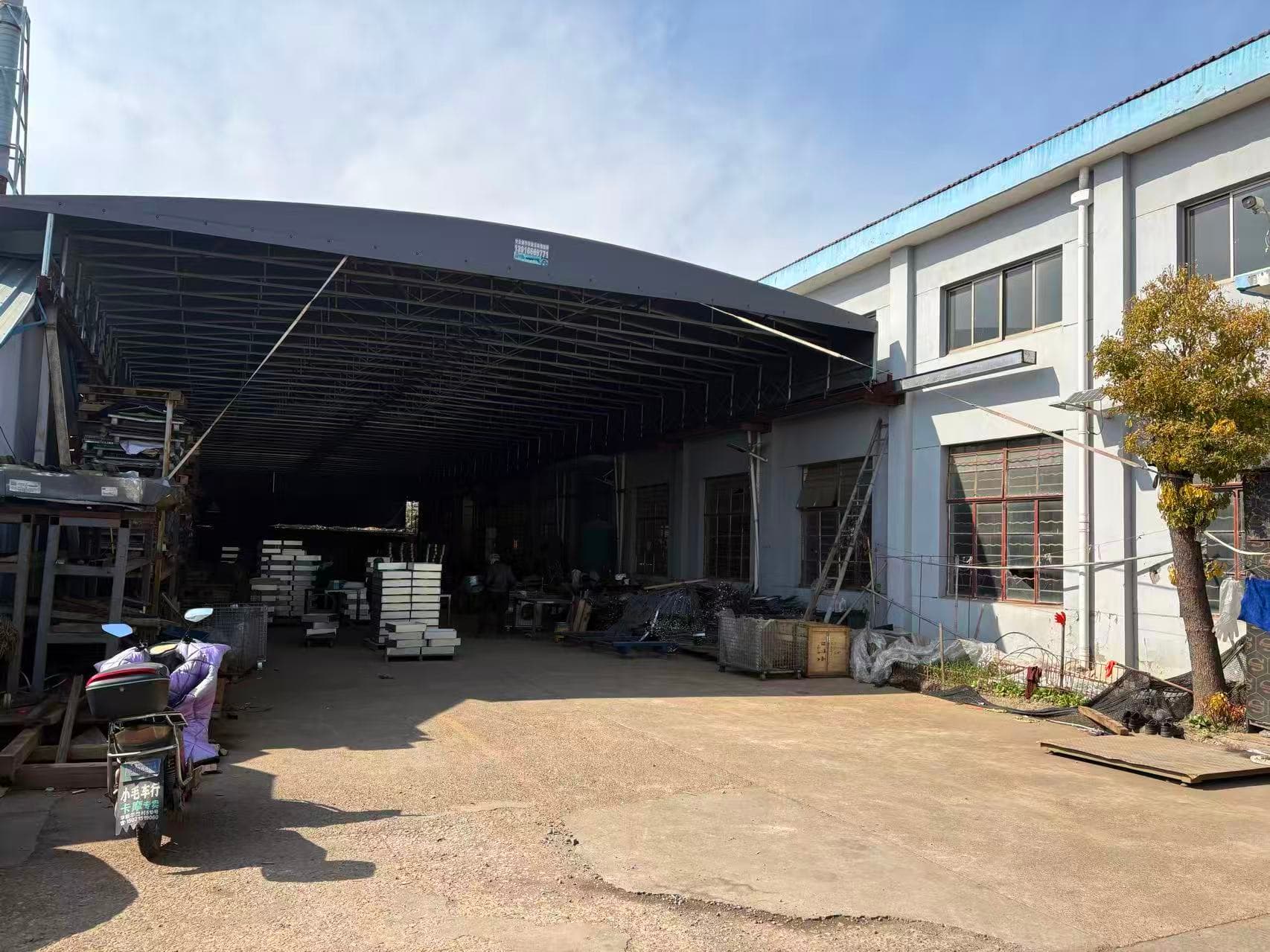 Factory exterior and yard area